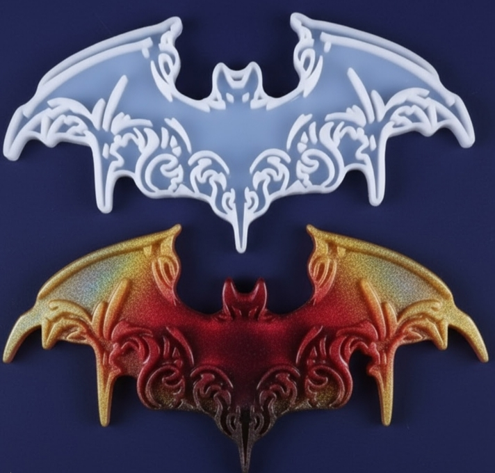 Ornate Gothic Bat Silicone Mold shown with white mold and a finished fire-and-gold resin cast piece