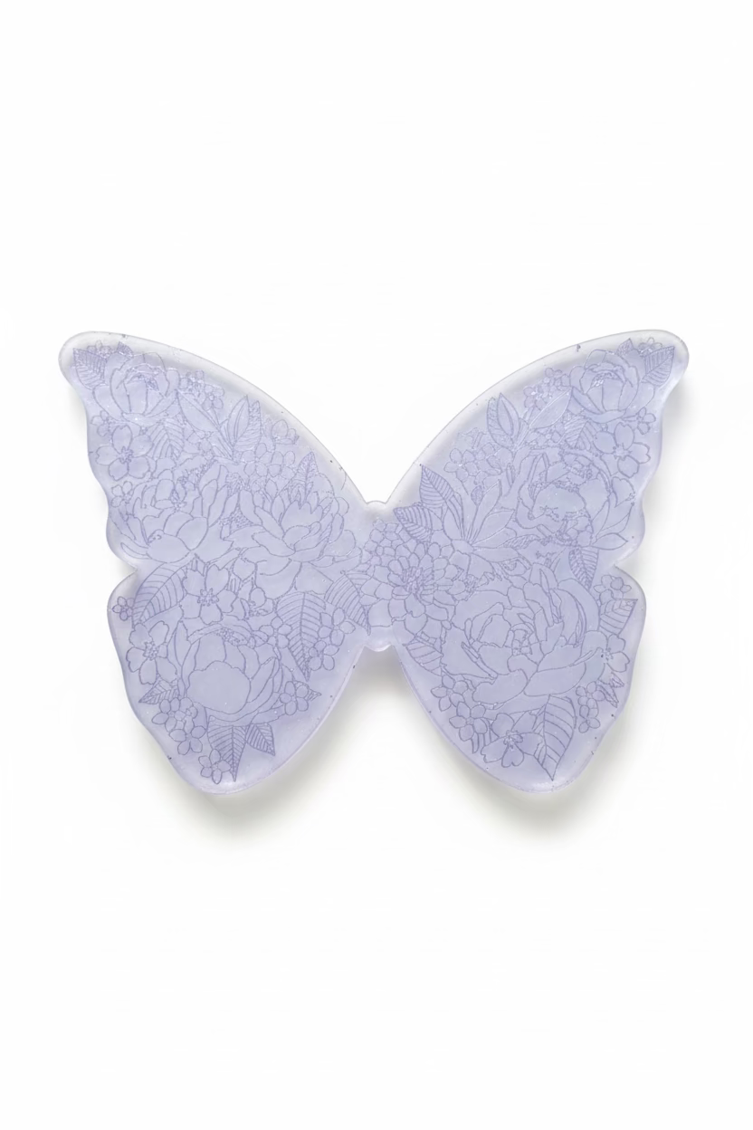 Iridescent butterfly wings on a dark fabric background